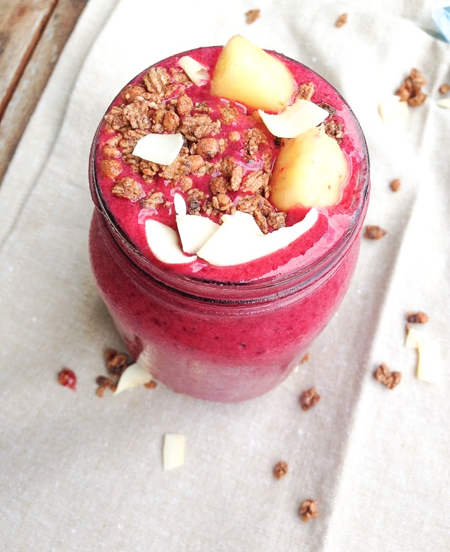 beetroot and banana smoothie topped with granola and coconut chips
