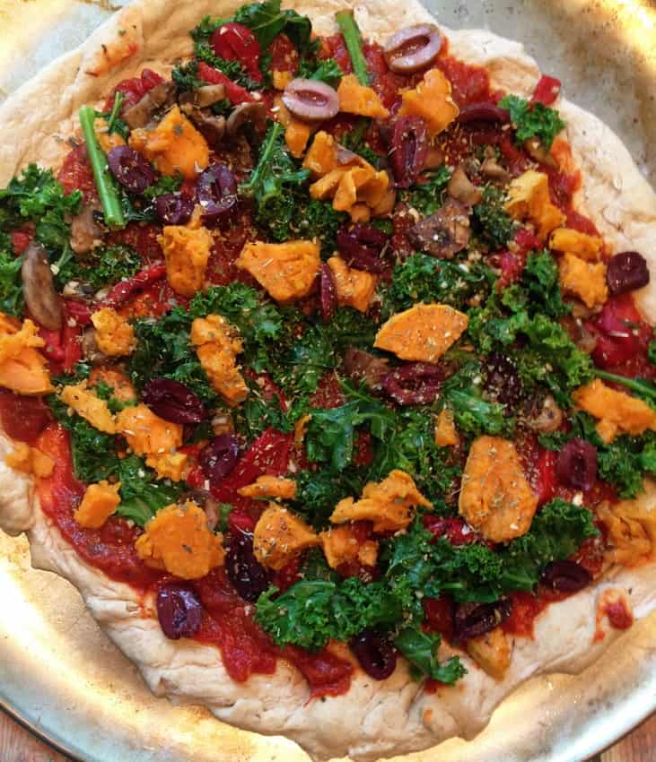 Sweet potatoes olives and kale pizza before putting in oven | Bucket List Tummy