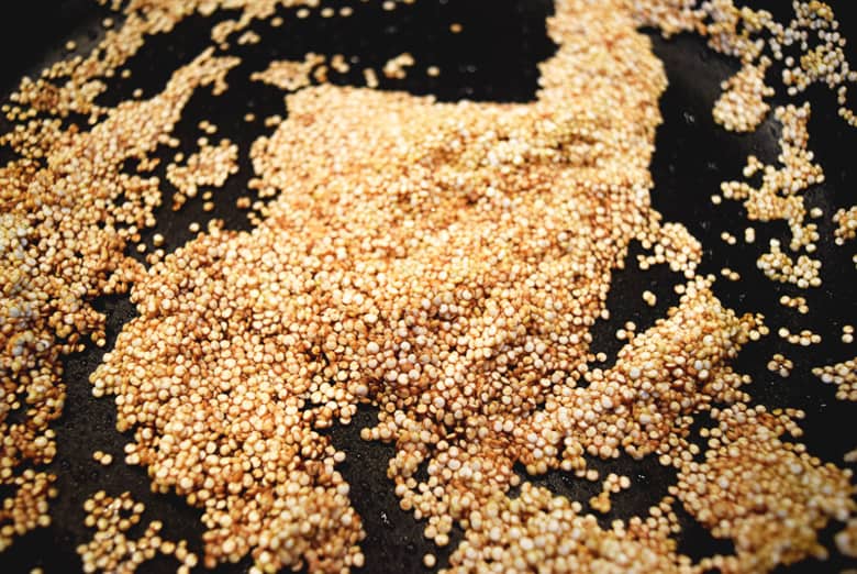 Toasted quinoa on skillet