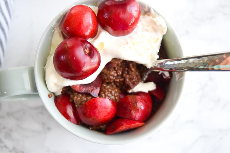 coconut milk chia pudding topped with cherries and whipped cream | www.bucketlisttummy.com 