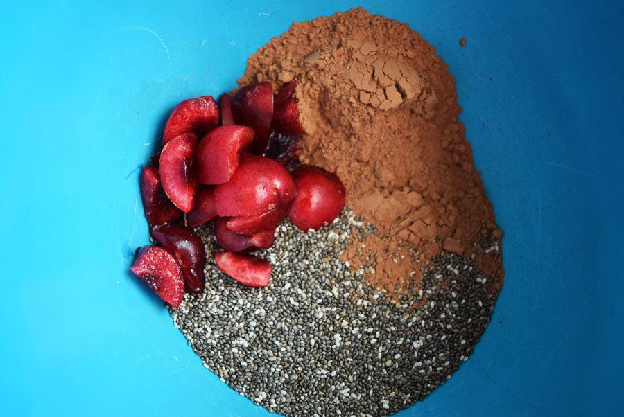Ingredients to make chocolate vegan chia pudding in blue mixing bowl | Bucket List Tummy