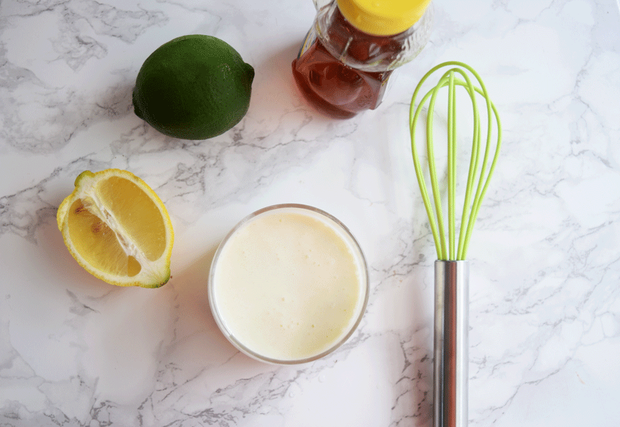 Ingredients for easy honey lime dressing recipe to pair with summer strawberry salad