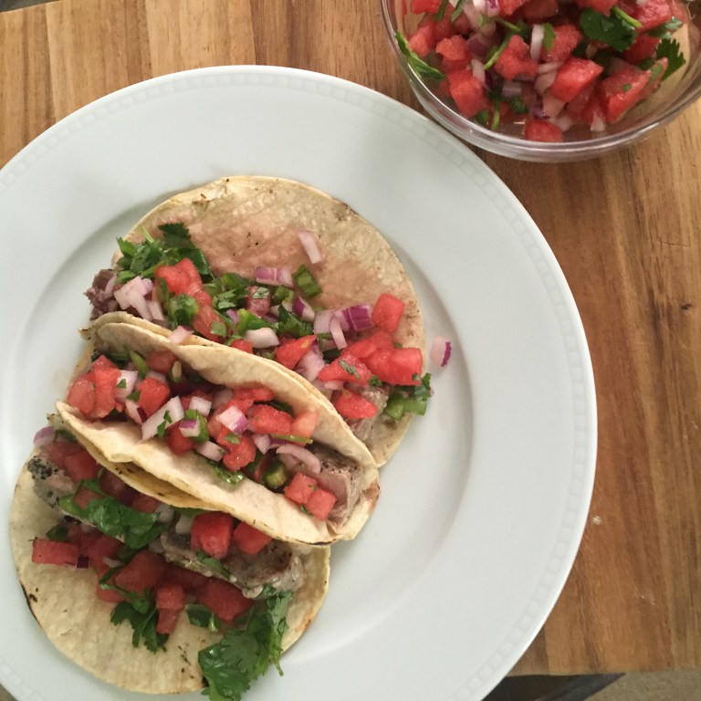 watermelon salsa taco filling served in tortillas on white plate