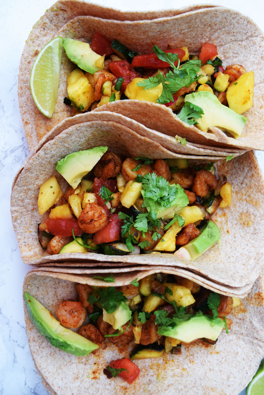 tortillas with avocado, pineapple and shrimp tacos