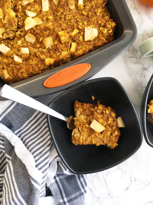 Apple Pumpkin Pie Baked Oatmeal is an easy, hearty breakfast option for on the go and for a crowd. Full of fiber, vitamins and spice, this baked oatmeal will have your whole kitchen smelling like fresh fall. 
