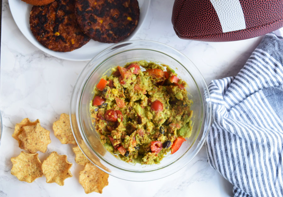 This Black Bean Avocado Dip requires only four key ingredients and provides a perfect healthy, vegetarian dip option for your fall tailgates. With a fun twist on guacamole, this Black Bean Avocado Dip is sure to be a hit!