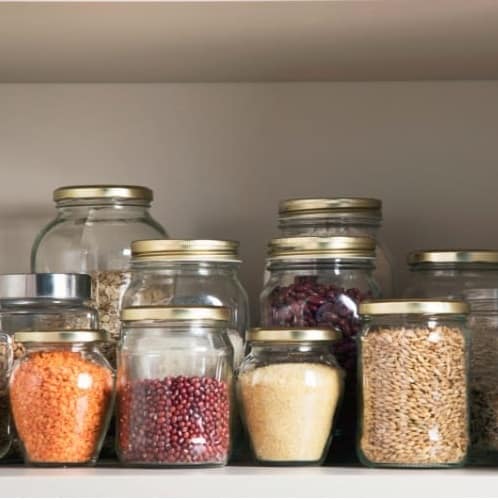 Pantry Staples in glass jars (oats, lentils, beans)