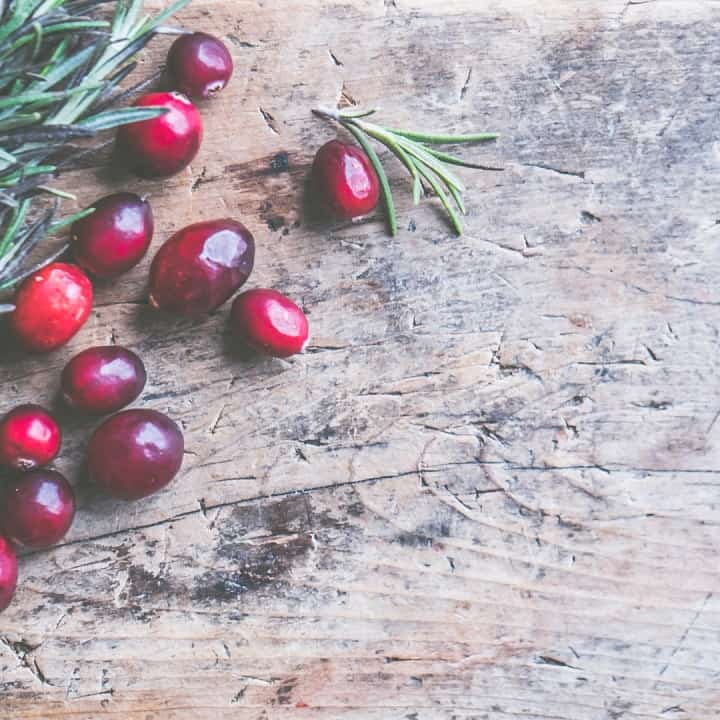 cranberries on wooden board