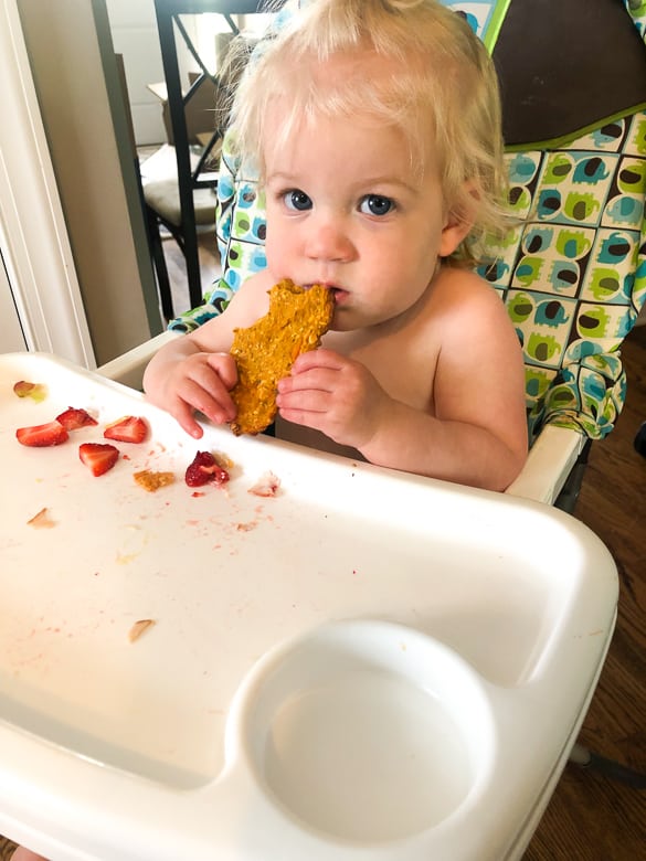 baby eating sweet potato pizza crust