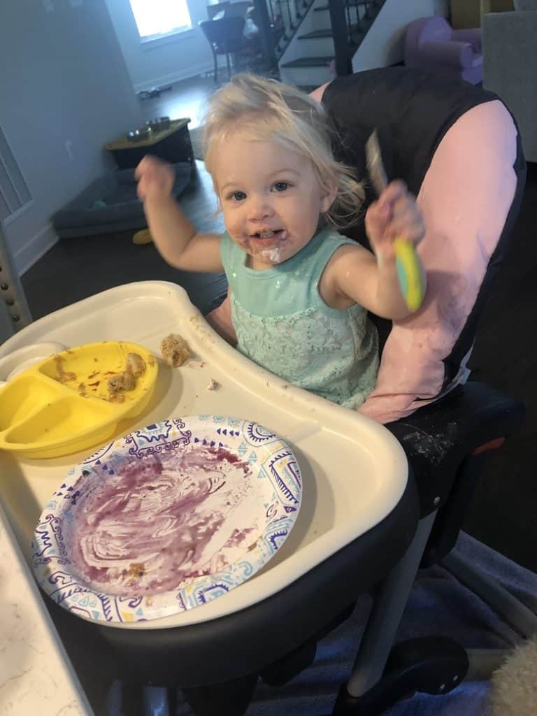 Toddler holding fork up with baby led weaning | Bucket List Tummy