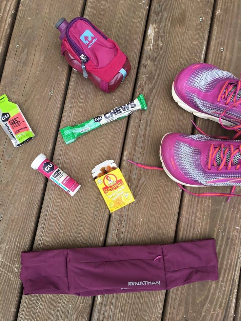 variety of endurance running nutrition products laid out on outside deck