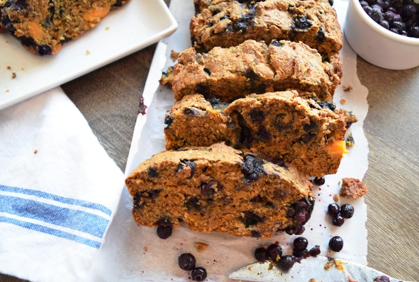 Healthy sweet potato quick bread with blueberries on a napkin | Bucket List Tummy