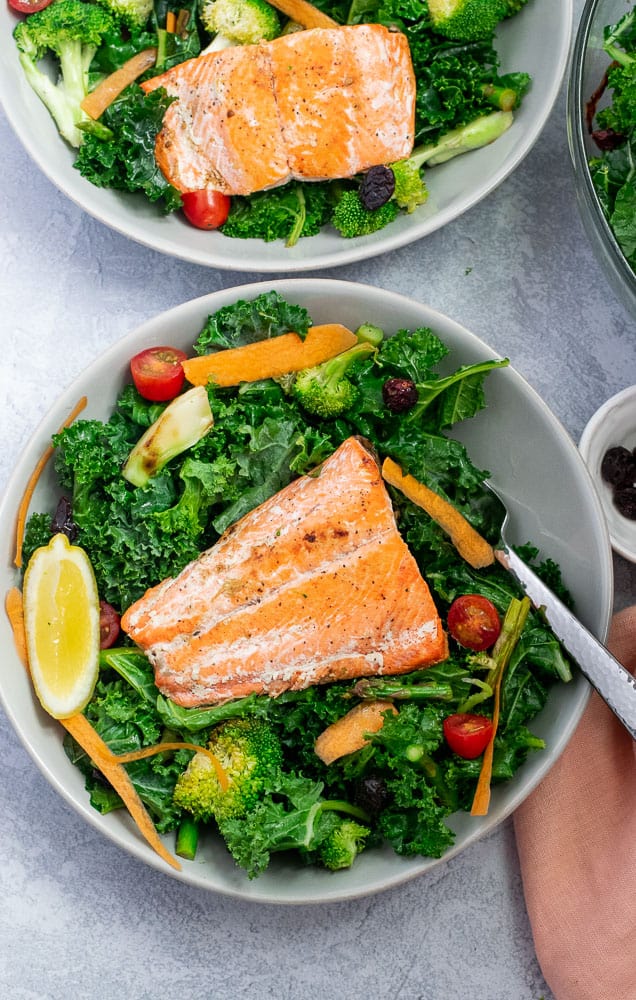 Broccoli Kale salad with Sockeye Salmon filet on gray bowl | Bucket List Tummy