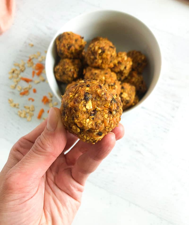 close up of rolled oats in vegan carrot cake bites 