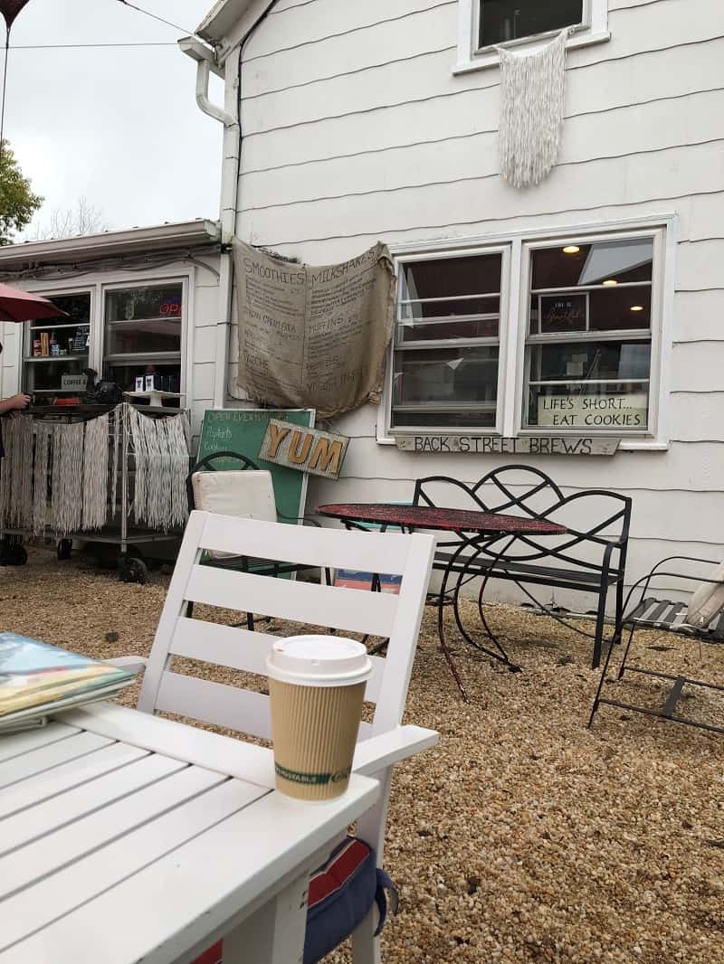 picture of coffee on white table at outdoor coffee shop