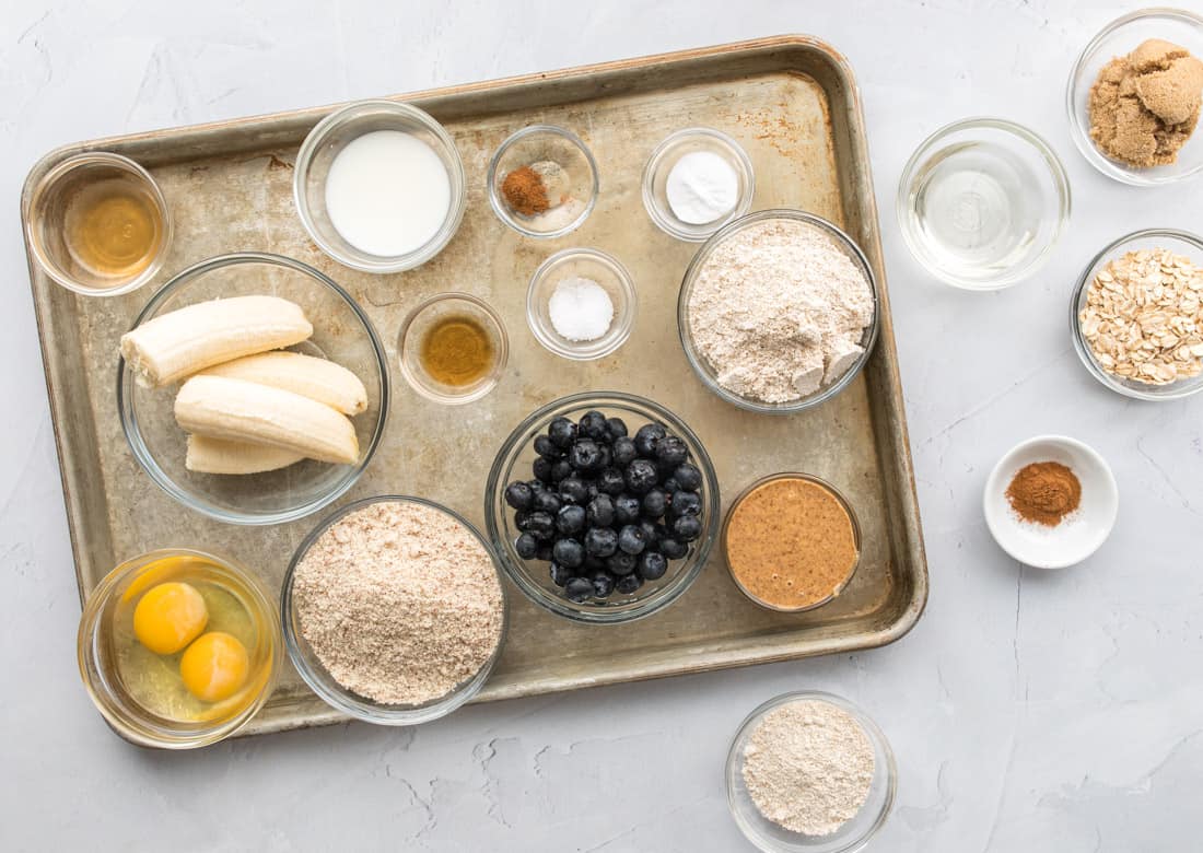 ingredients on baking sheet for gluten free blueberry muffins