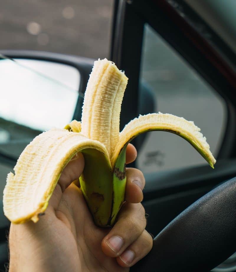 Peeled banana for a road trip snack for kids