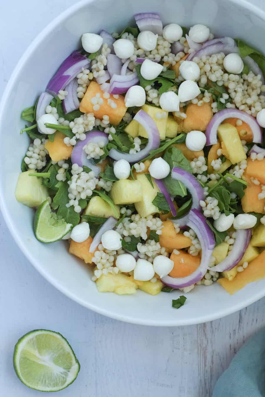 Pineapple salad recipe with mozzaralla, red onion and cous cous