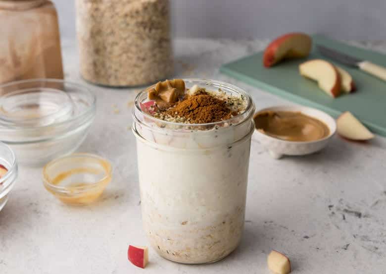 meal prep oatmeal made overnight in a mason jar with oats, cottage cheese, seeds and spices