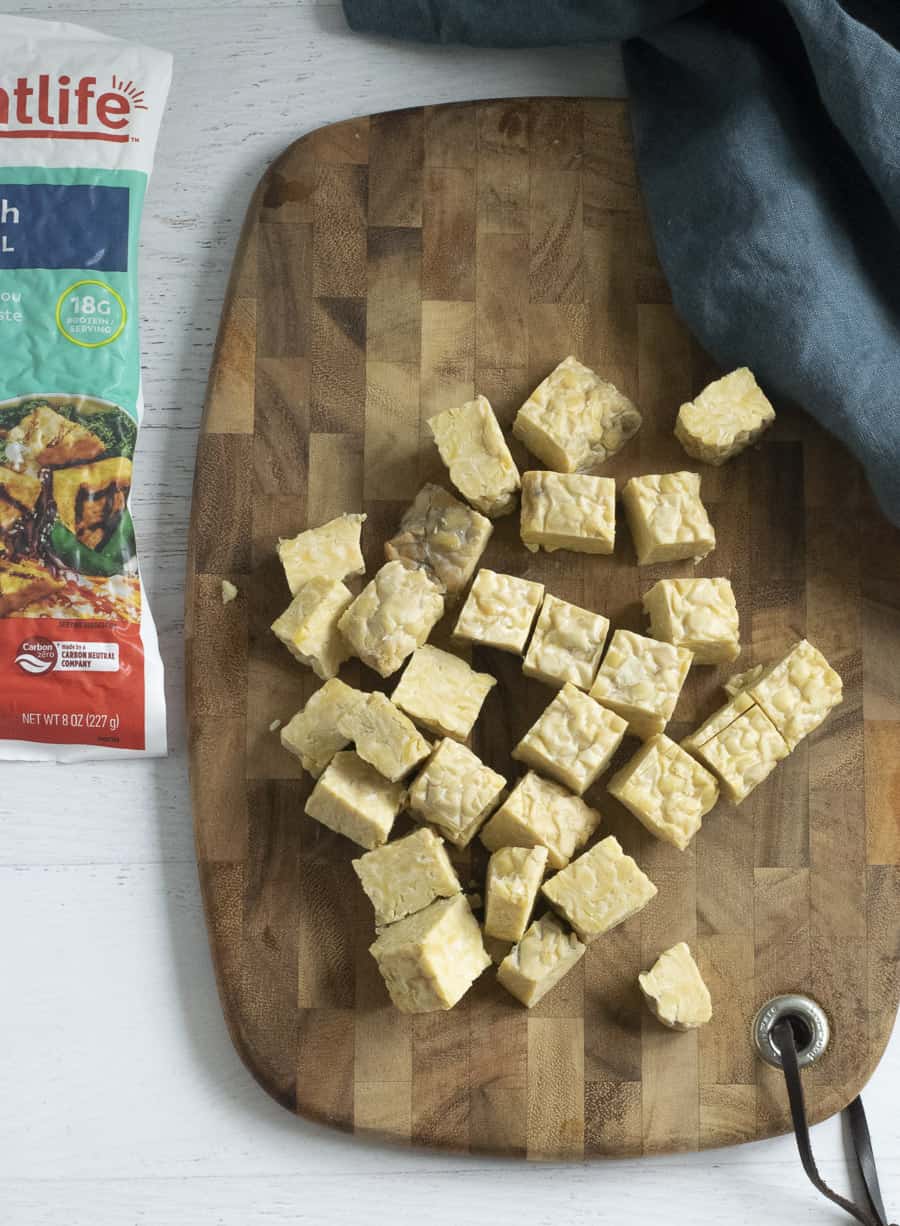 tempeh on cutting board before adding to air fryer
