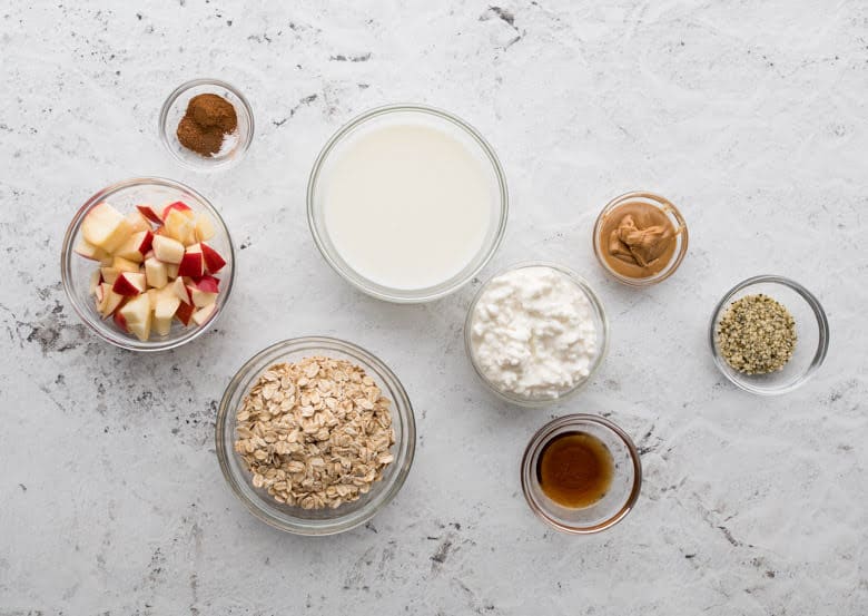 ingredients in glass containers to make apple pie overnight oats